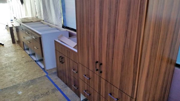 Missy MCI 102 RV cabinets panty oiled olivewood laminate veneer motorhome custom