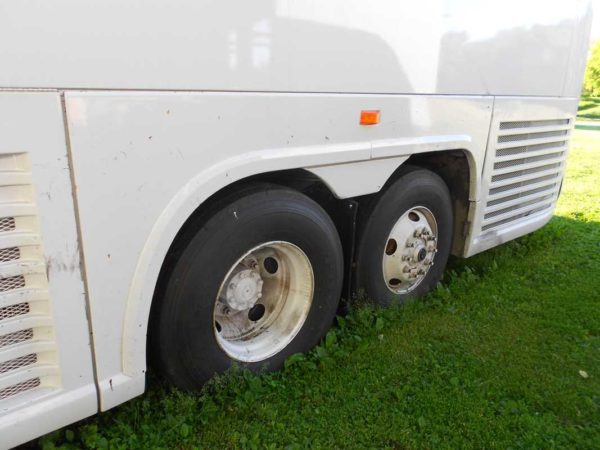 Missy 1998 MCI 102-EL3 coach bus conversion tire blowout wheel panel repair