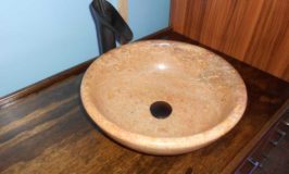 RV bus conversion vessel sink bathroom travertine stone
